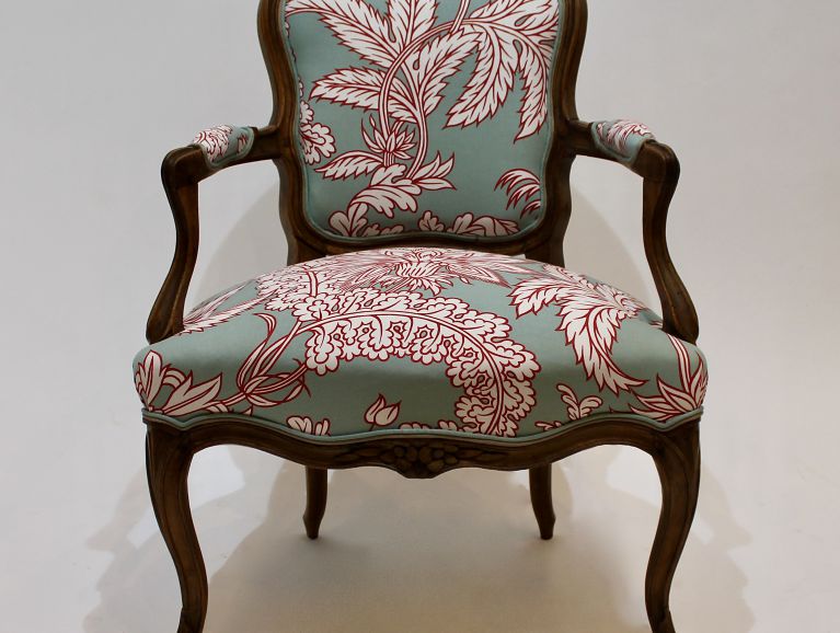 Complete refection of a Louis XV armchair - Fabric from the Toile de Mayenne publisher with double Houles piping finish