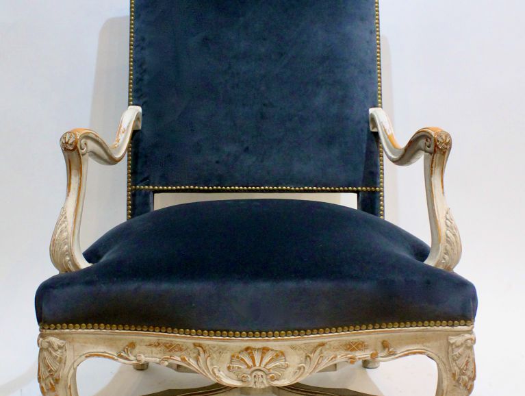 Complete refection of a Regency armchair studded finish
